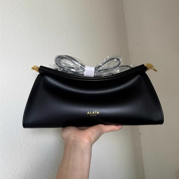 Alaia Handbags - Alaia Black Crossbody Bag with Gold Details